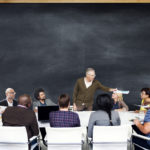 Picture of professor in front of students