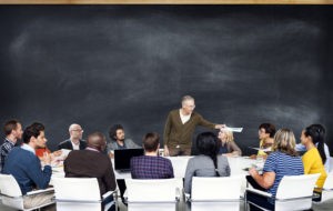 Picture of professor in front of students