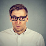 Picture of preoccupied man worried about why file out of state tax returns