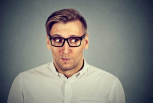 Picture of preoccupied man worried about why file out of state tax returns