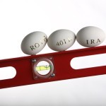 Picture of eggs balanced on a carpenter's level