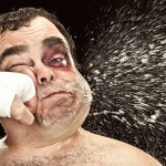 Picture of guy getting punched in face.