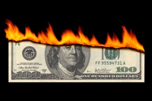 Picture of $100 bill on fire.