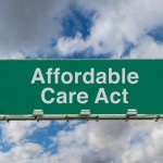 Picture of freeway sign with phrase Affordable Care Act