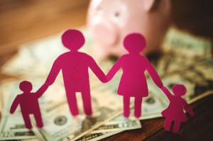 Picture of paper doll cut-outs representing a family.