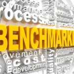 Picture of sign with word benchmarking in big yellow letters